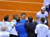 Italia's Team players Fabio Fognini,center, and Simone Bolelli,right, celebrates at end doble match against Croatia's Team players Ivan Dodig and Marin Cilic during the Davis Cup 1st round World Group in Turin, Italy, Saturday, Feb 2, 2012. (Ap Photo/Massimo Pinca)