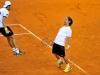 Italia's Team players Fabio Fognini,right, and Simone Bolelli,left, celebrates at end doble match against Croatia's Team players Ivan Dodig and Marin Cilic during the Davis Cup 1st round World Group in Turin, Italy, Saturday, Feb 2, 2012. (Ap Photo/Massimo Pinca)