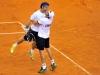 Italia's Team players Fabio Fognini,left, and Simone Bolelli,right, celebrates at end doble match against Croatia's Team players Ivan Dodig and Marin Cilic during the Davis Cup 1st round World Group in Turin, Italy, Saturday, Feb 2, 2012. (Ap Photo/Massimo Pinca)