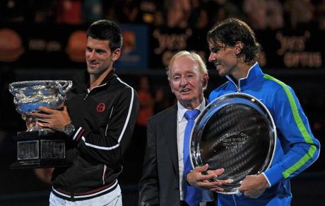 Tennis legend Rod Laver (C) poses with r