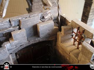 Costruzione 140: Finestre dell'ingresso (2) e nicchia votiva