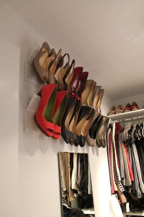 Hang crown molding for shoe storage in a wasted space in the closet.
