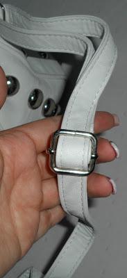 J&M; pochette con borchie.