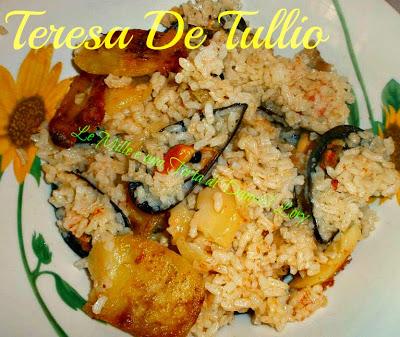 RISOTTO AL FORNO CON PATATE E COZZE