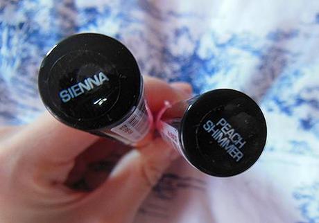 Out The Plumping Lipgloss in Sienna & Peach Shimmer.