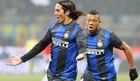 Inter Milan's Schelotto celebrates after scoring against AC Milan during their Italian Serie A soccer match in Milan