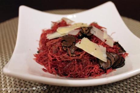 Sfilacci di cavallo con scaglie di tartufo e parmigiano