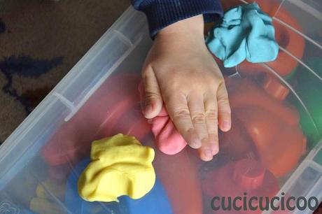 squashing handmade play doh