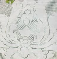 Schemi per il filet: Un cuscino dai motivi originali