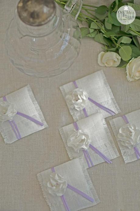 BOMBONIERE FIORITE IN LINO E GLICINE / Linen party favors