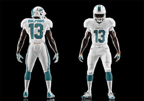 Miami Dolphins, maglia nuova Nike e cambio logo Miami-Dolphins-new-football-uniforms-Nike-2013