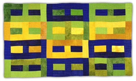 PATTERNS GEOMETRICI CON COLORI ELETTRIZZANTI NEI QUILTS DI ELEANOR MCCAIN