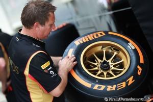 Mechanic working on the new P Zero orange hard tyre