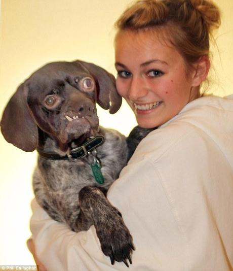 SLadies' man: Ms Parker's daughter Skye proudly poses with the family's beloved pet