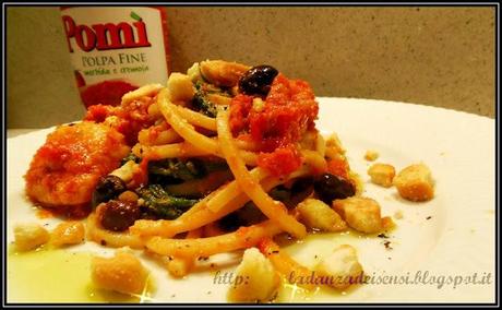 SPAGHETTI ALLA CHITARRA CON RUCOLA AL SUGO DI BACCALA' ED OLIVE TAGGIASCHE