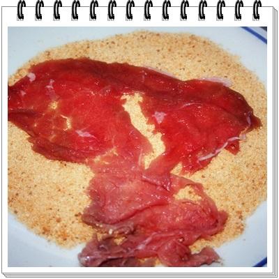 Millefoglie di carpaccio di manzo con melanzane e pomodorini