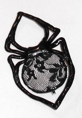 Glossy lace spider brooch