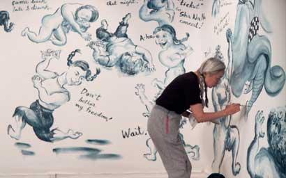 Noriko Shinohara working on a painting. From Zachary Heinzerling’s CUTIE AND THE BOXER, a documentary about the 40-year marriage of artists Ushio and Noriko Shinohara. Photo credit: Zachary Heinzerling.