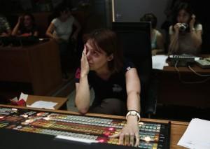 An employee works to broadcast Web-Tv signal at control room of Greek state television ERT headquarters in Athens