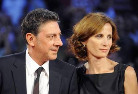 Italian actor Sergio Castellitto and his wife, Italian writer Margaret Mazzantini arrive for the screening of 