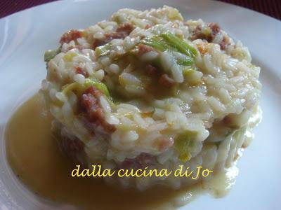 Risotto ai porri e fiori di zucca, mantecato allo zola