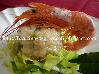 Timballino di risotto con gamberoni e scarola