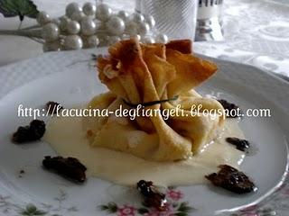 Fagottini con crema di robiola e lamelle di tartufo