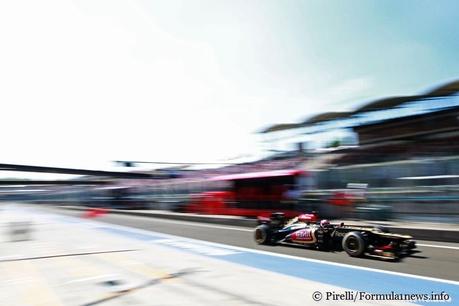 Romain Grosjean (Lotus) in the pit lane