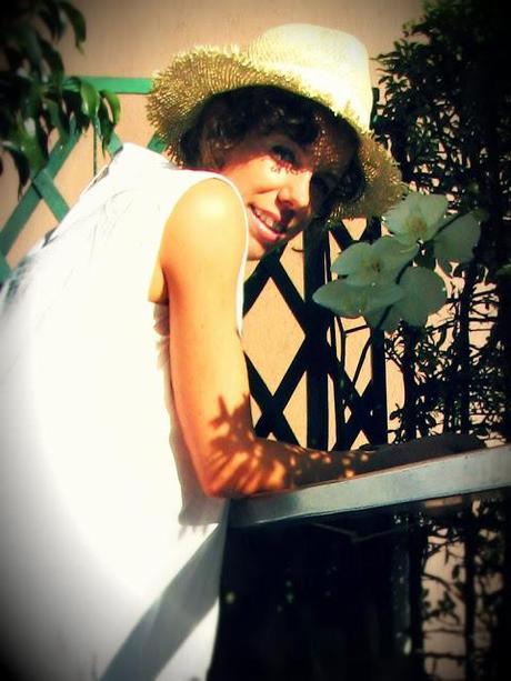 White cover up and straw hat