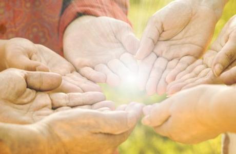 focus point on  center hands (red shirt) special toned and sun light photo f/x