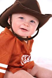 happy smiling 6-month old baby boy portrait