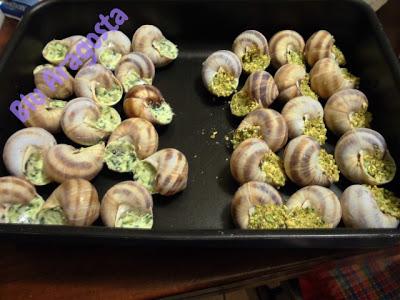 Lumache alla bourguignonne in crosta di pistacchi, escargot à la bourguignonne en croûte de pistaches