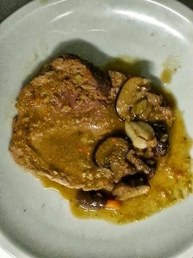 Arrosto di maiale a cottura lenta con funghi cremini