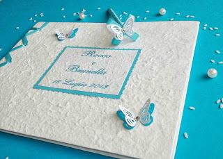 Matrimonio in blu: partecipazioni eleganti blu, ideali anche per comunione o cresima ragazzo, ventagli apribili, guestbook personalizzato