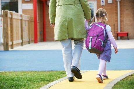 Mom-walking-daughter-to-school