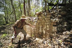 a-national-institute-of-anthropology-and-history-inah-worker-shows-the-remains-of-a-building-at-the-newly-discovered-ancient-maya-city-chactun-in-yucatan-peninsula