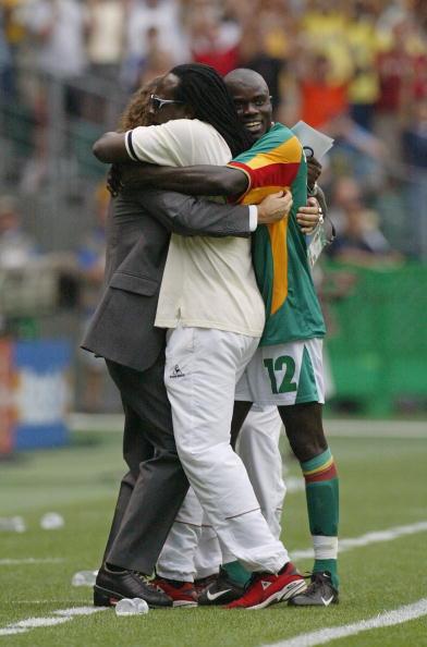 Senegal's assistant coach Jules Bocande (C), Seneg