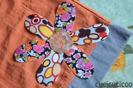 flower applique on ripped pants