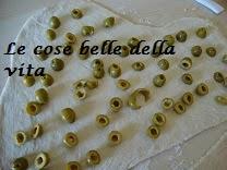 Rose di pane alle olive e al prosciutto