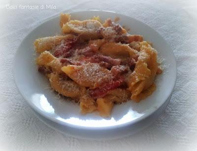 Caramelle con zucca, pancetta e pomodorini