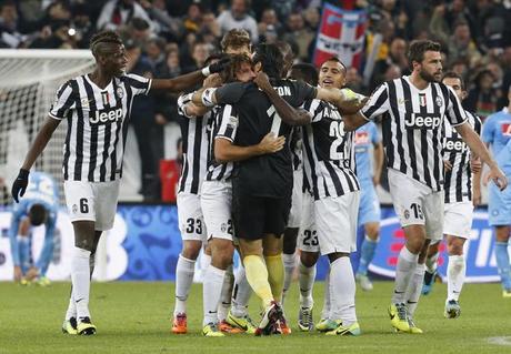 Juventus' Pirlo celebrates with teammates after scoring against Napoli during Italian Serie A soccer match in Turin