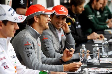 Jenson Button and Checco Perez at the autograph signing session