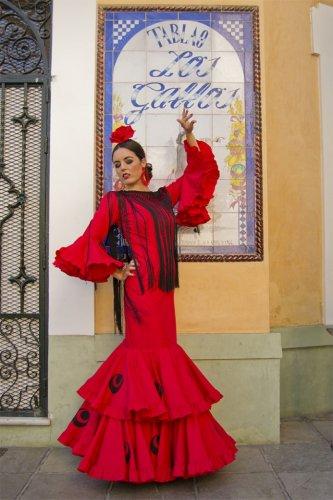 La bellezza del vestito da flamenca tradizionale: pois, volants, sensualità e Siviglia