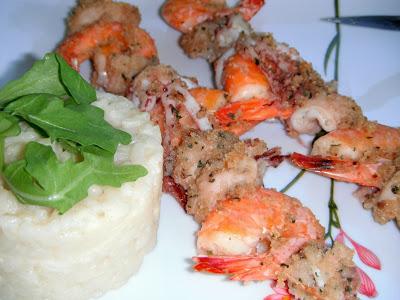 Spiedini di pesce con riso al curry