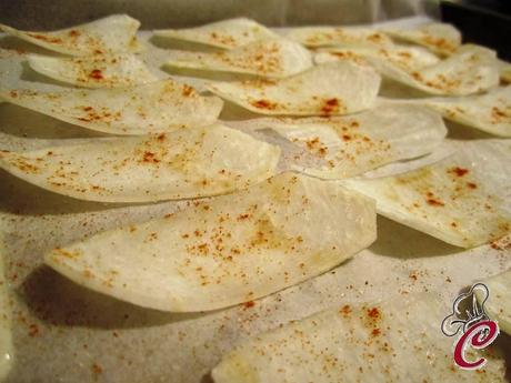 Pepite di merluzzo in crosta di mais su chips di rapa alla paprika:sfizi genuini in ottimizzazione domestica