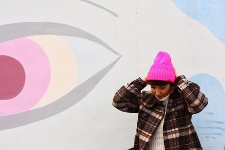 Pinocchio earrings and a fluo beanie