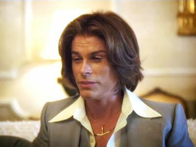 Behind the candelabra