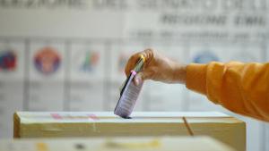 Italy's voter casts their ballots at a p