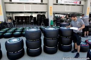 Mercedes team personnel is checking tyres