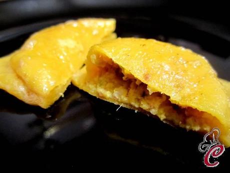 Ravioli di zucca con ripieno al branzino: il formato prescelto di una coccola rara, ma ben elaborata